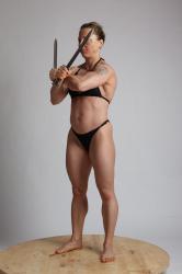 Woman Adult Muscular White Fighting without gun Standing poses Underwear
